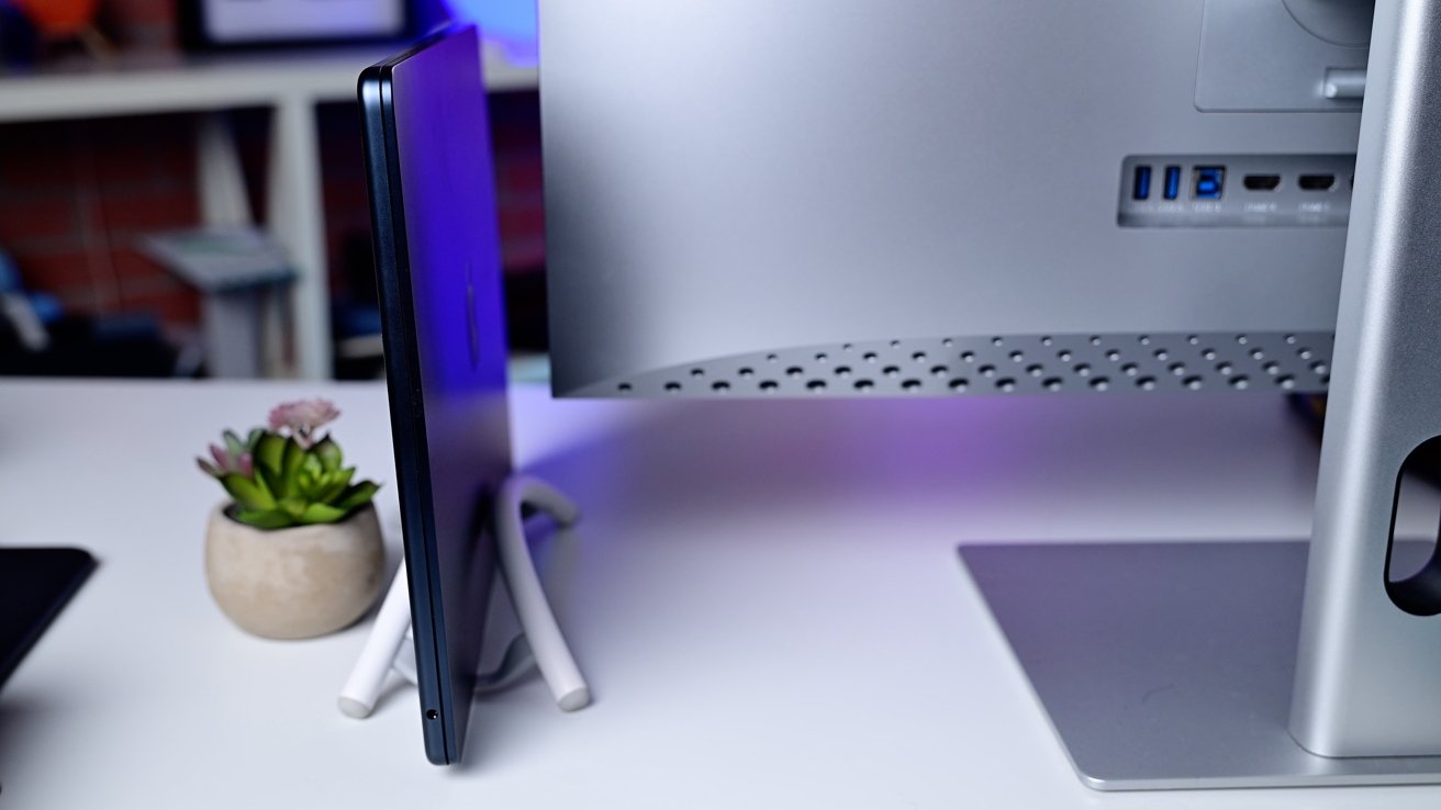 MacBook Air next to a monitor