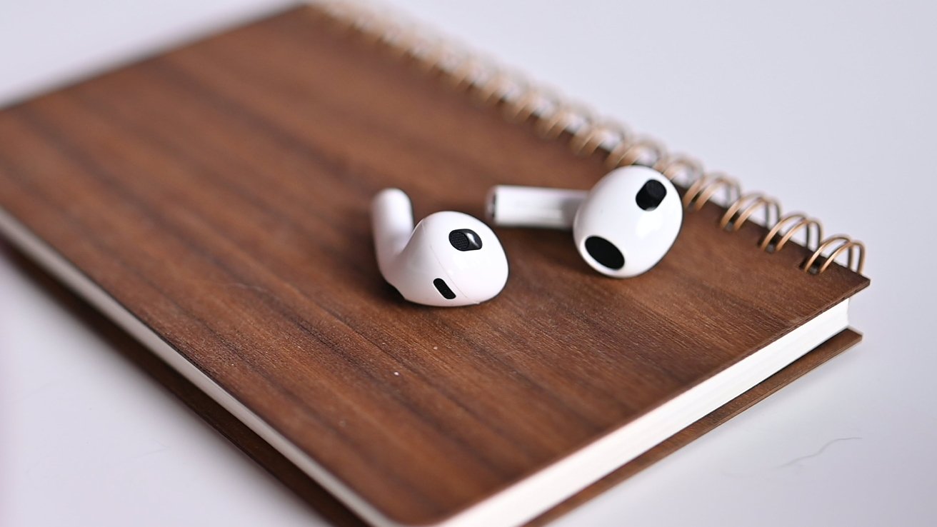 AirPods 3 on a notebook