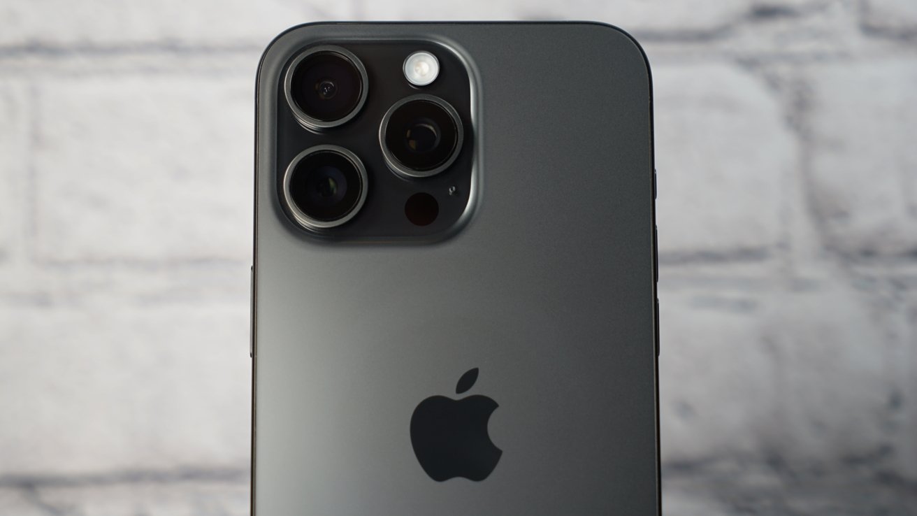 The iPhone 15 Pro Max in Space Black with the camera bump in view