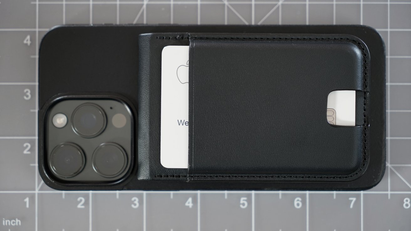 The Loc8 wallet on the back of an iPhone