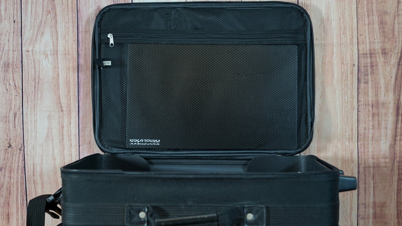 A portable monitor in the zipper portion of a suitcase