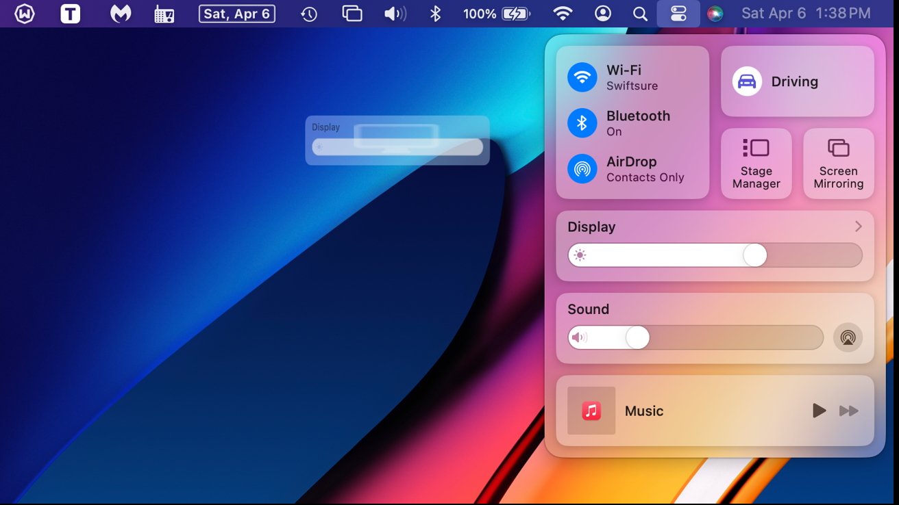 Computer screen showing a colorful desktop wallpaper with an open control center interface indicating Wi-Fi, Bluetooth, and battery status.