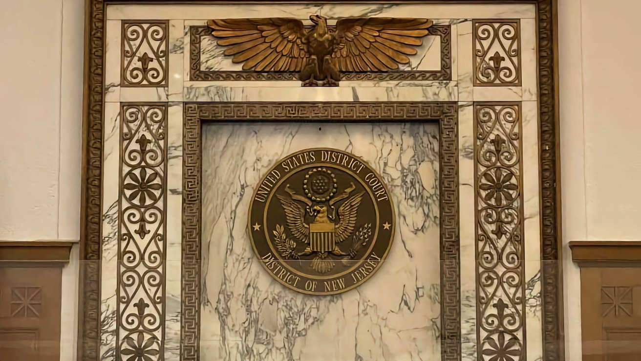 An image taken in a courtroom with the US District Court seal for New Jersey