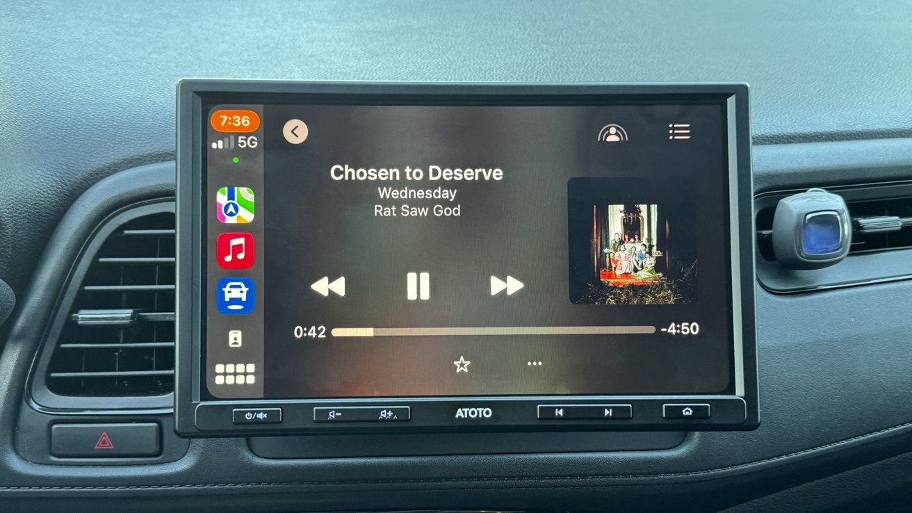 CarPlay showing Apple Music in full screen mode with 'Chosen to Deserve' playing