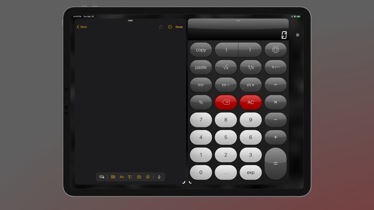 An iPad displaying a calculator app with a dark mode interface on a gray background