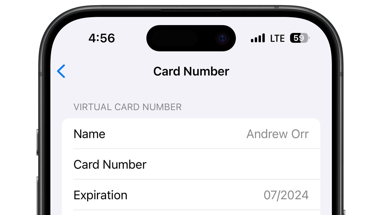 A smartphone displaying a virtual card interface with fields for name, card number, and expiration date.