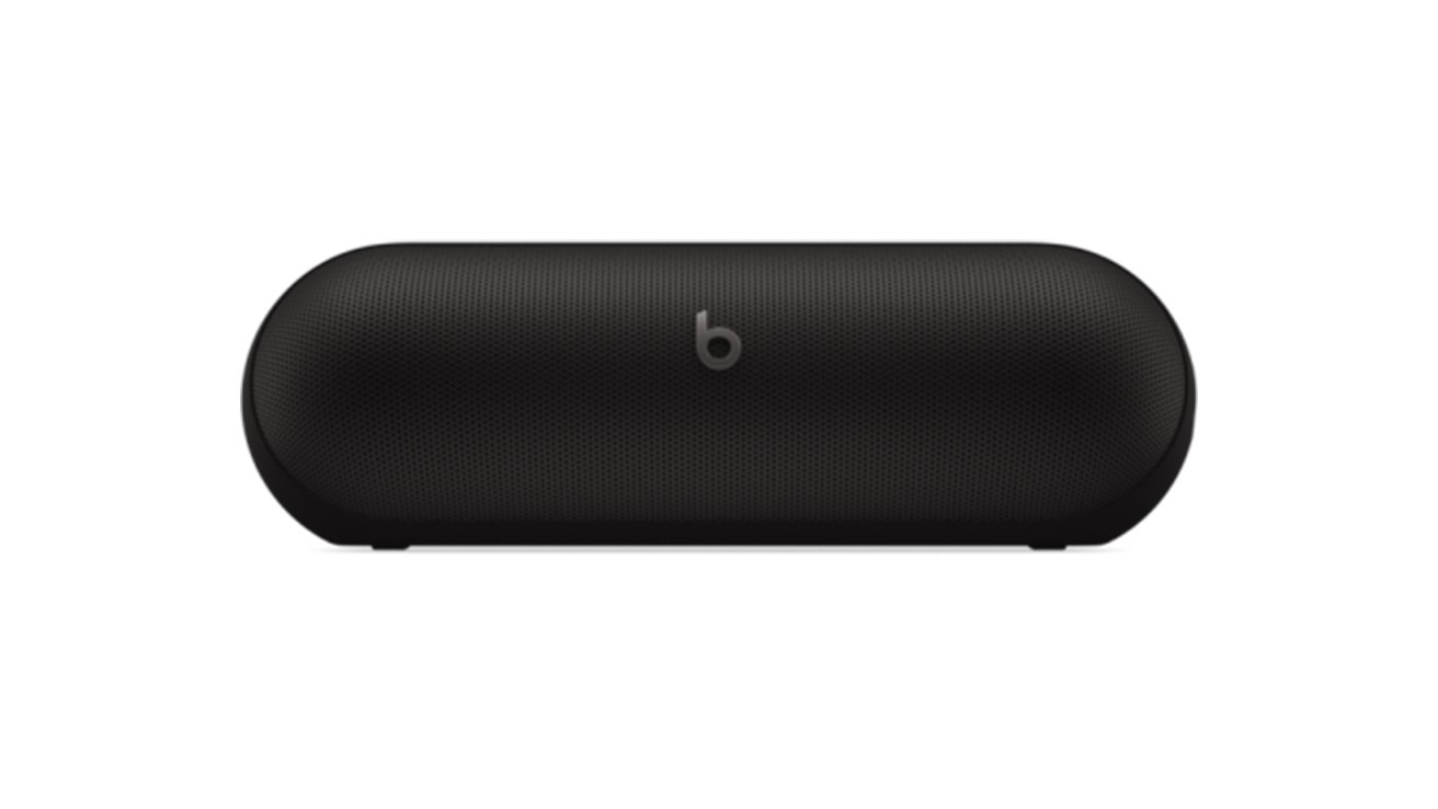 A black cylindrical Bluetooth speaker with the letter 'b' logo centered on the grille.