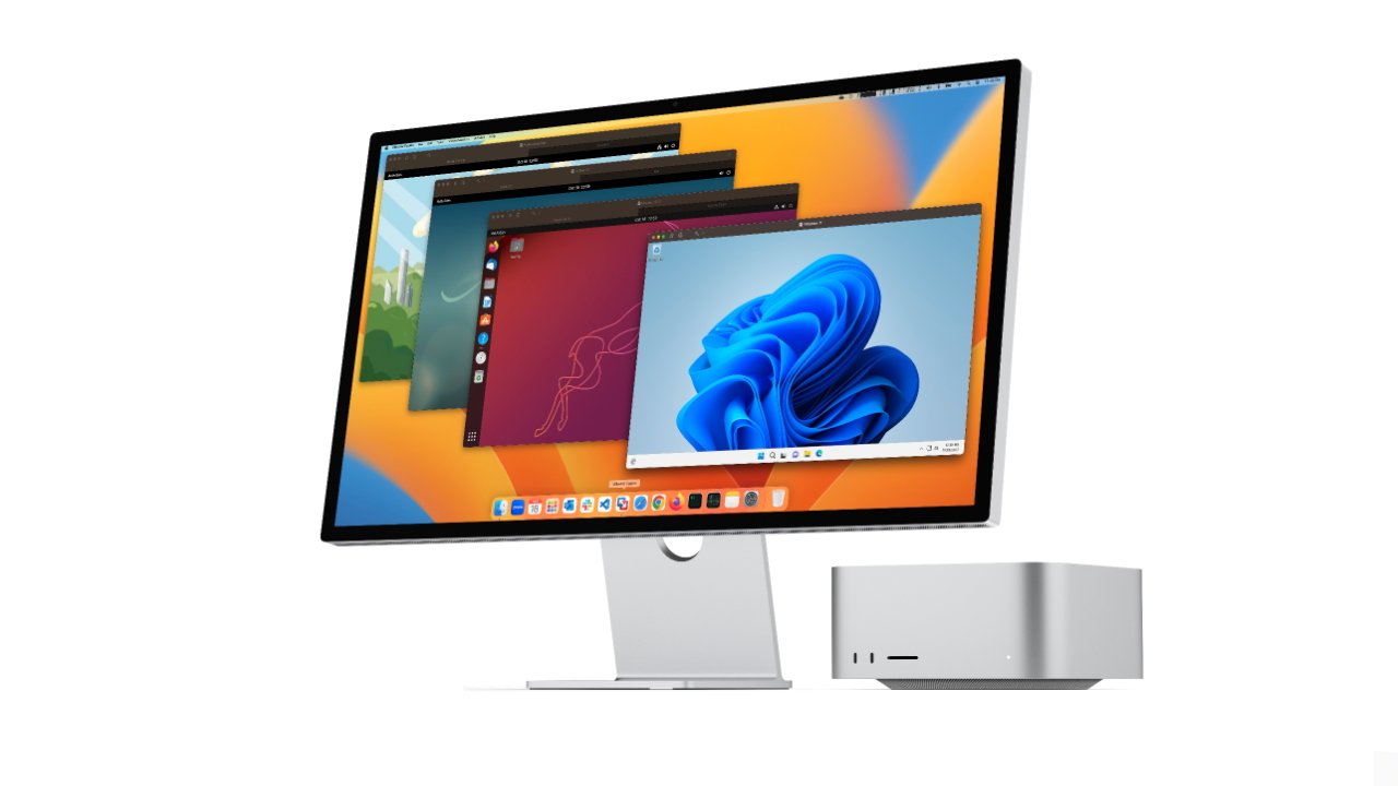 Computer monitor displaying colorful wallpapers, accompanied by a sleek keyboard and external computer unit, against a white background.