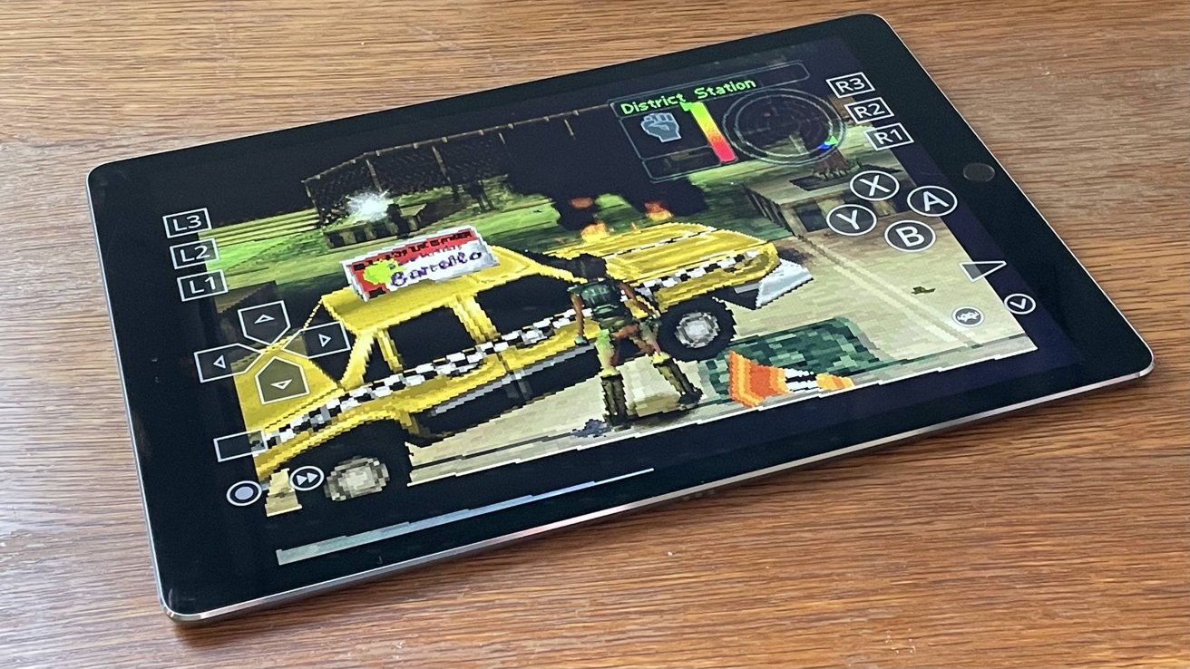 A tablet displaying a classic video game with pixelated graphics featuring a character and a yellow taxi cab on screen.