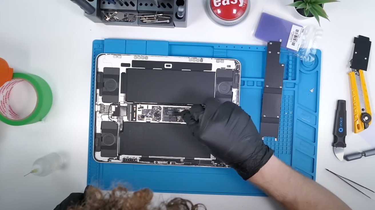 Mid-teardown of the 13-inch iPad Pro with M4 [Youtube/Phone Repair Guru]