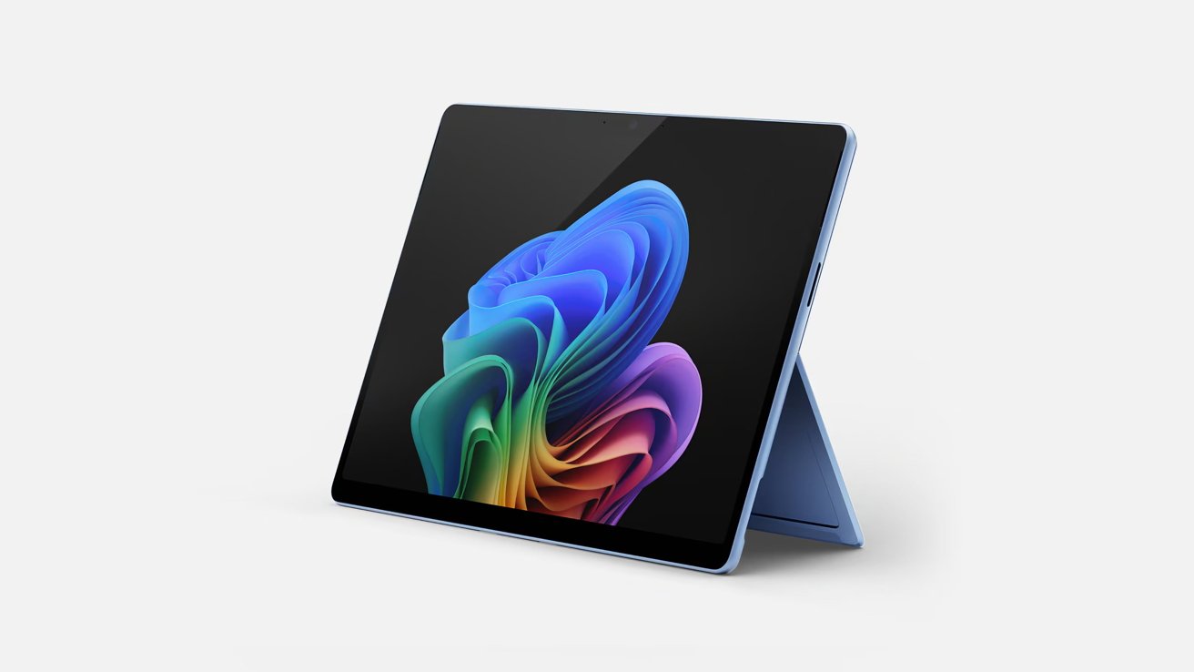 Tablet with a colorful abstract design on screen, standing on a blue kickstand against a plain white background.