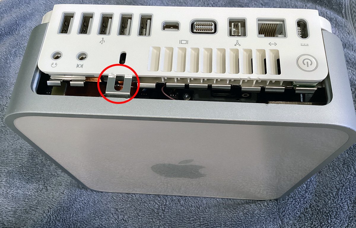 Apple Mac mini being reassembled.