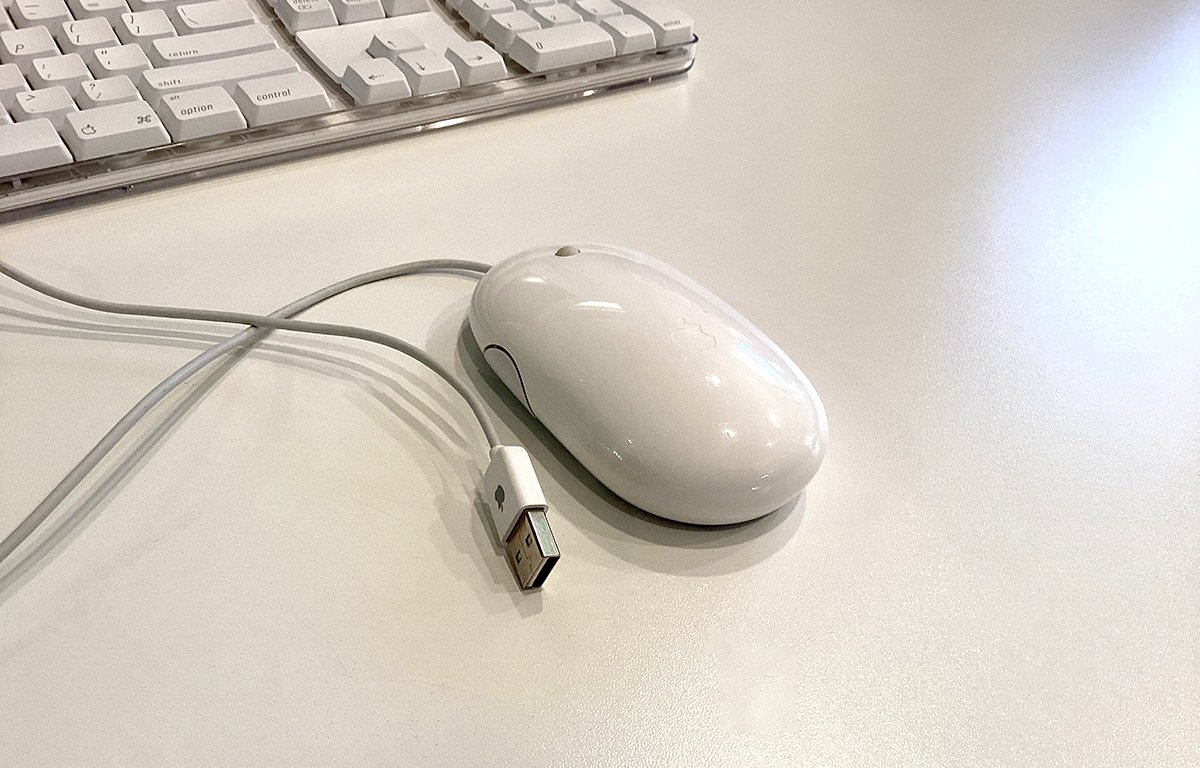 Apple's vintage white wired USB mouse.