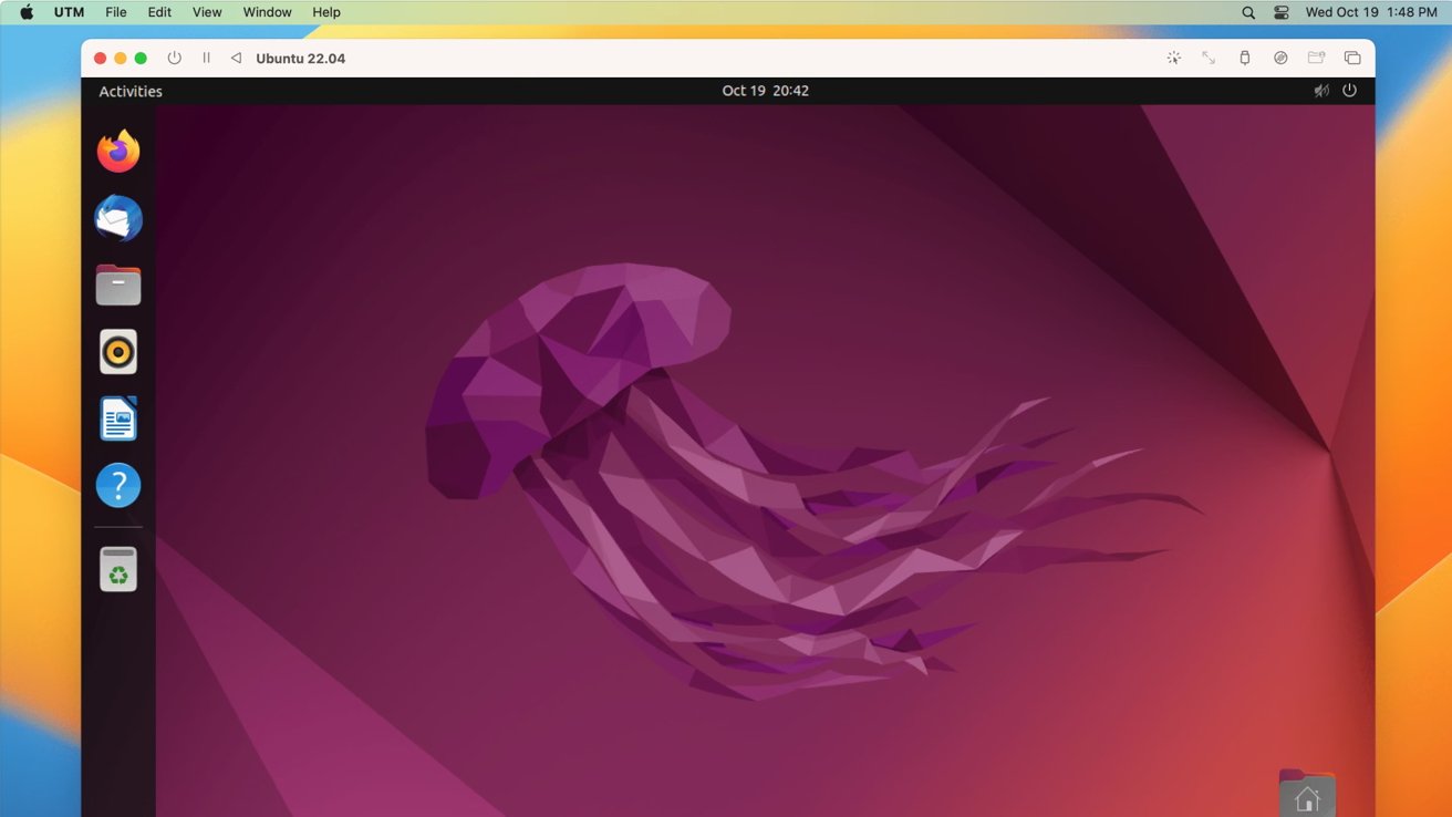 Ubuntu 22.04 desktop with a purple low-poly art jellyfish wallpaper, dock on the left with various application icons