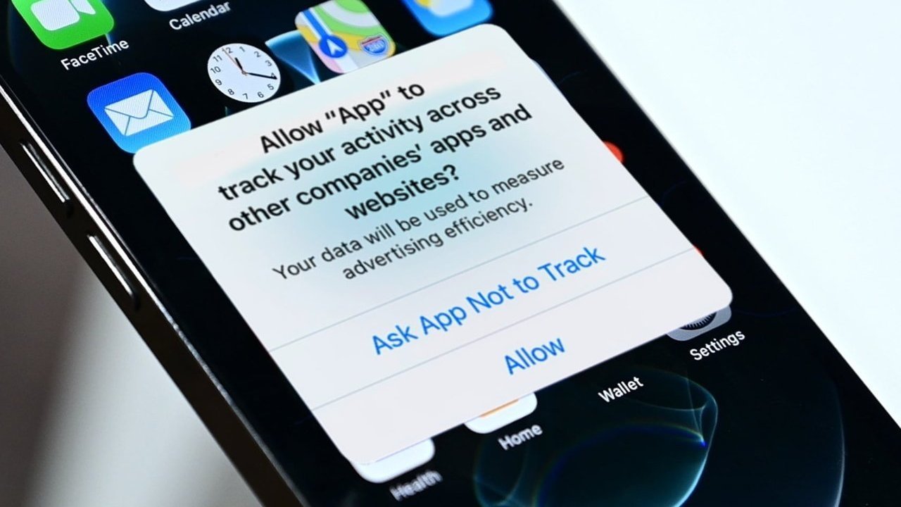 Smartphone screen showing an app permission request to track user activity, with options to 'Ask App Not to Track' or 'Allow'.