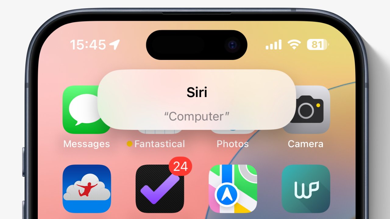 Close-up of a smartphone screen showing a Siri prompt for 'Computer' with various app icons including Messages, Camera, and Fantastical.