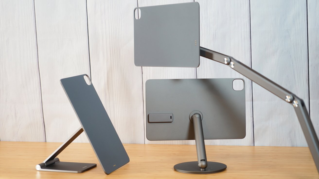 A group of three magnetic iPad charging stands, each with different designs