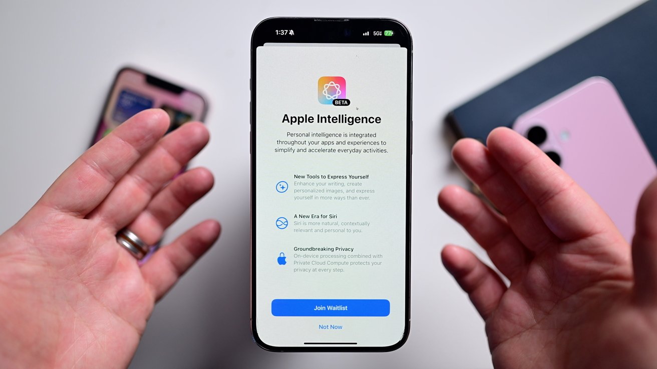 Two hands gesturing to an iPhone with the getting started screen for Apple Intelligence