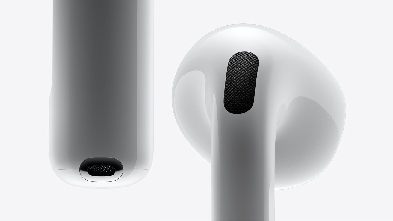 Close-up view of two white earphones against a plain background, showing detailed textures and speaker grilles.