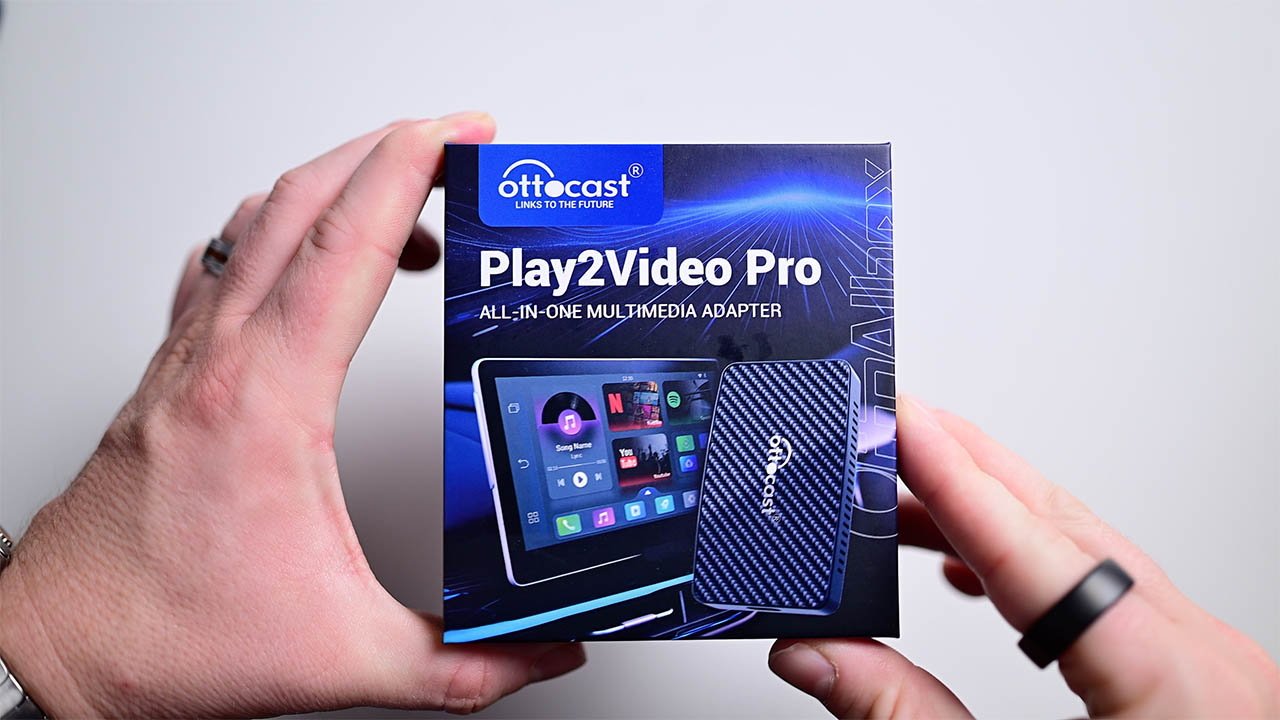 Ottocast Play2Video Pro universal multimedia adapter in a box.