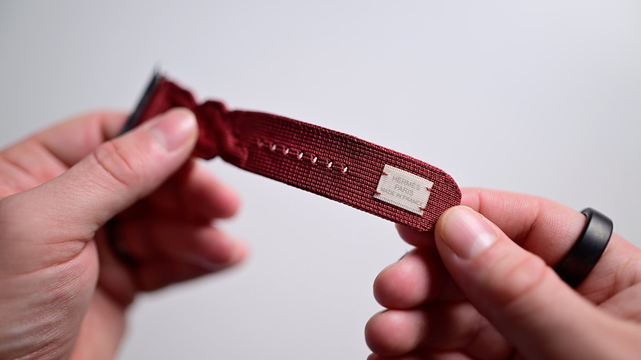 A small Hermes label is stitched on the underside of the band