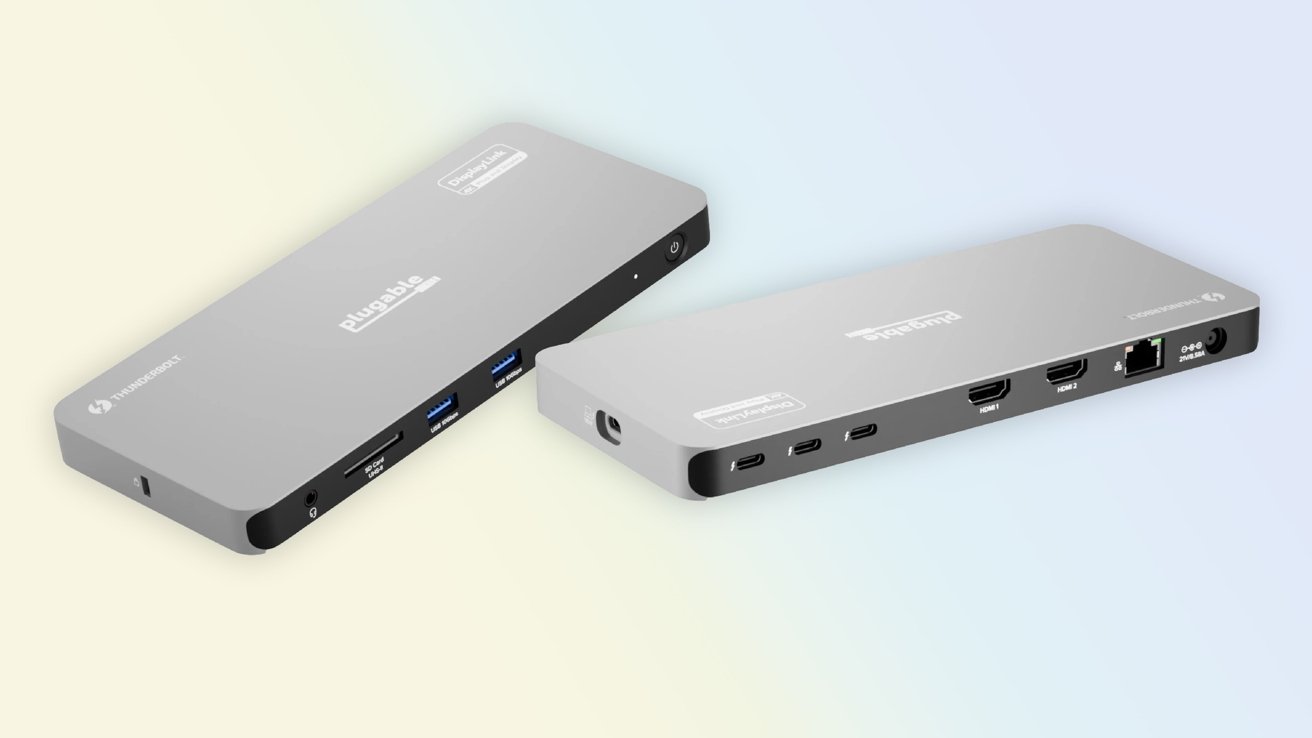 Two gray rectangular electronic devices with various ports, including USB, HDMI, Ethernet, SD card slot, and headphone jack on a gradient background.