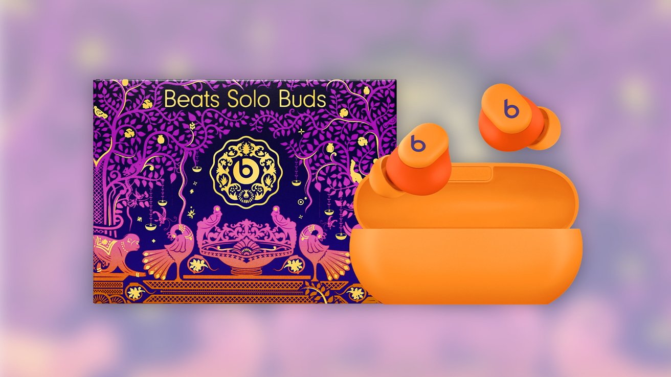 Colorful packaging with intricate purple and orange patterns, displaying Beats Solo Buds next to matching orange earbuds and charging case.