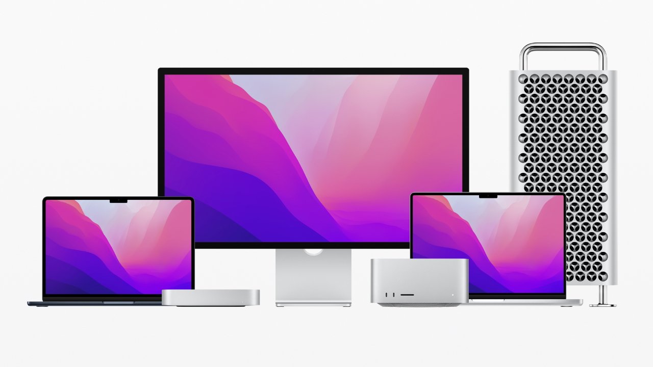 Various Apple devices including two laptops, a desktop monitor, a Mac Mini, and a Mac Pro against a white background, all displaying a pink and purple gradient wallpaper.