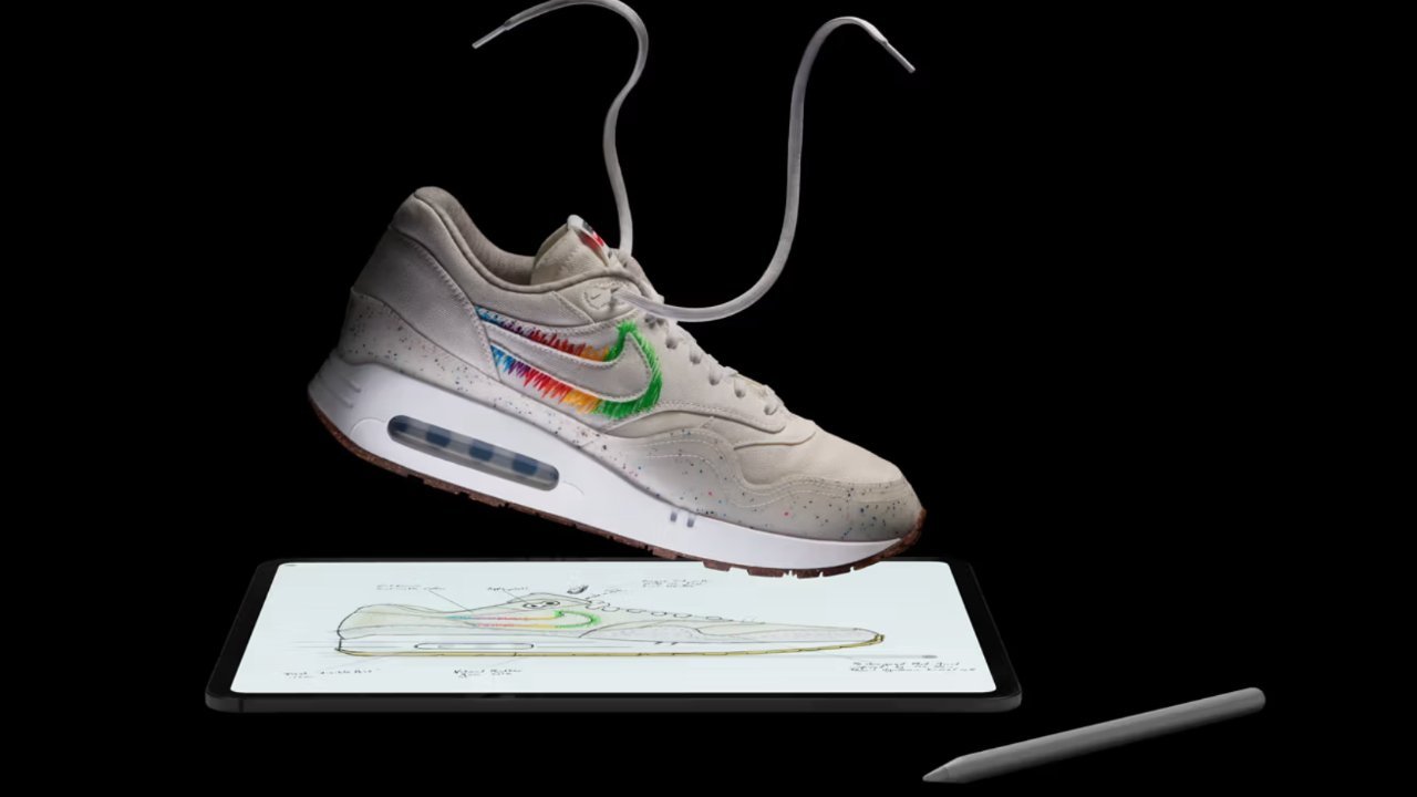 Floating sneaker with colorful swoosh above a tablet displaying its sketch with a stylus on the side, against a black background.