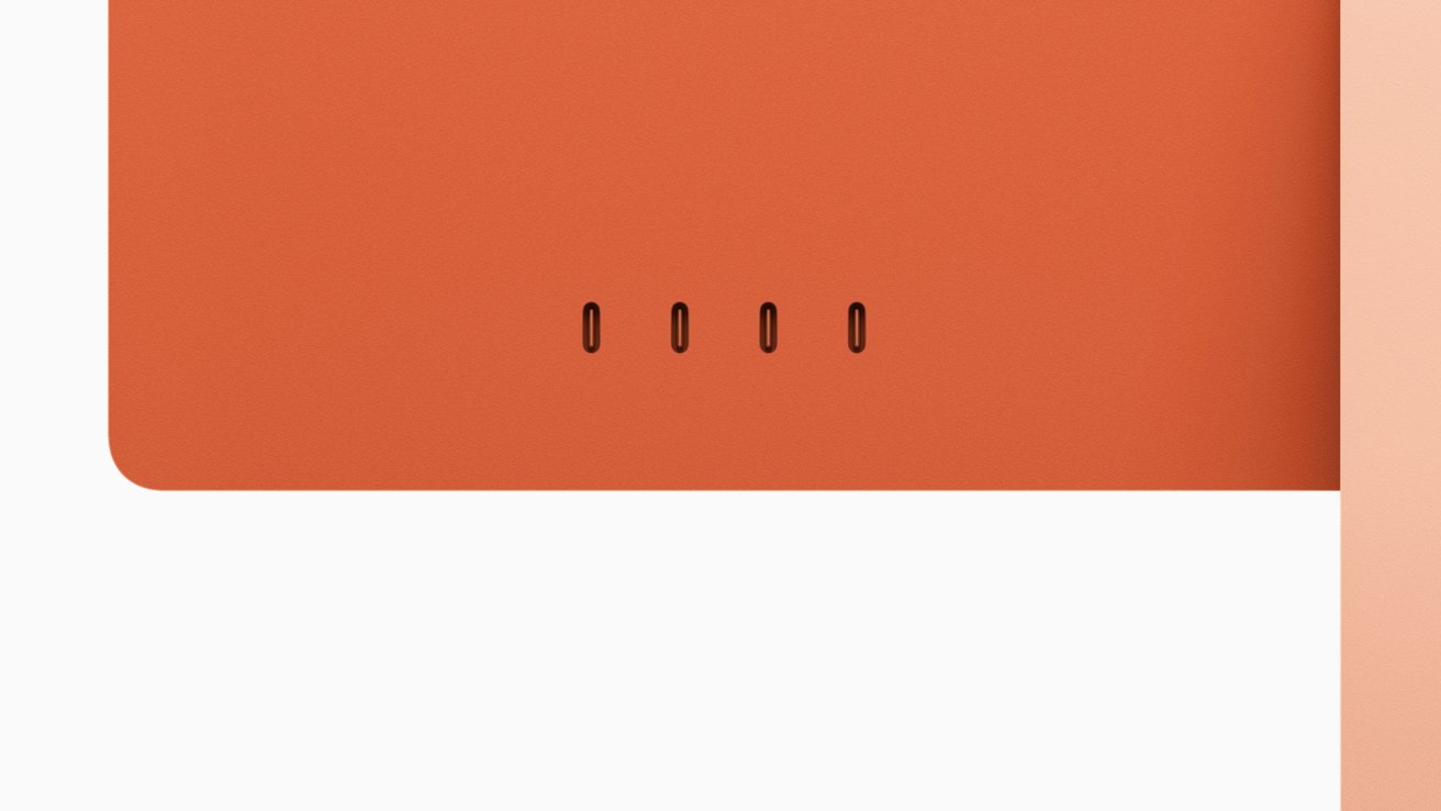 Orange background with four small vertical oval cutouts, adjacent to a beige section on the right.