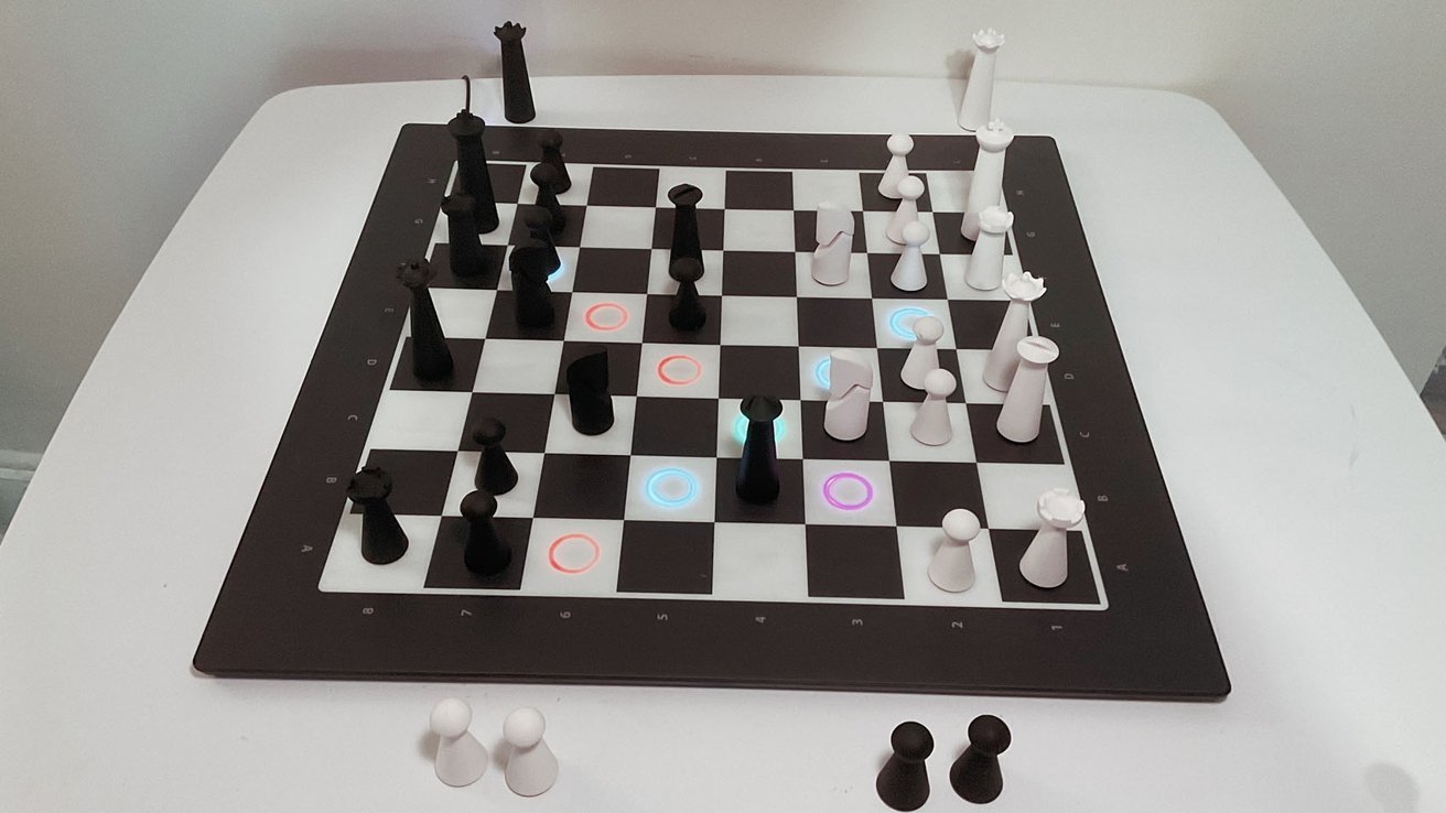 A modern chessboard with black and white abstract pieces, some squares illuminated with colored circles.