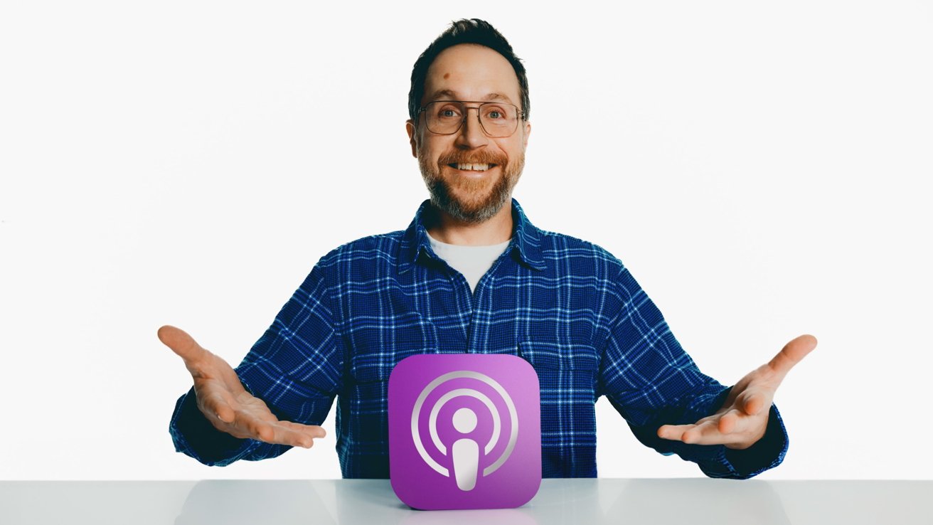 Smiling person with glasses and a beard wearing a blue plaid shirt, gesturing with open hands in front of a purple podcast icon.