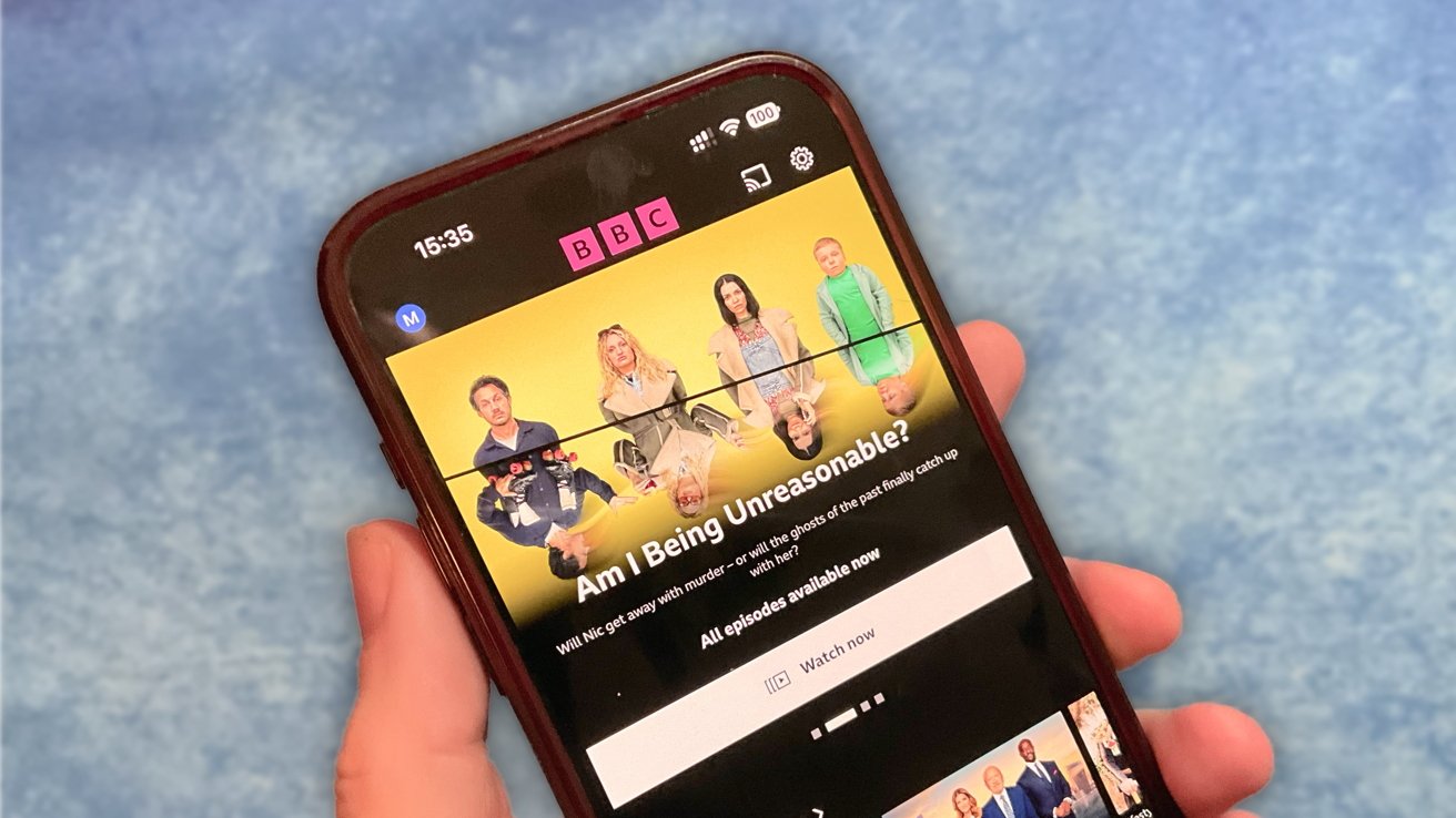 Phone displaying a BBC show titled 'Am I Being Unreasonable?' with several people against a yellow background.