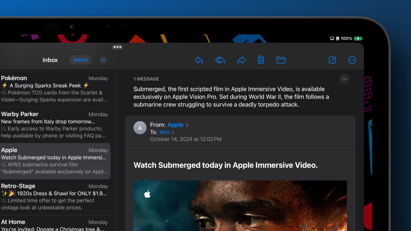 Email client interface on a tablet displaying message about 'Submerged,' a World War II submarine film on Apple Vision Pro. Inbox shows various email previews on the left.