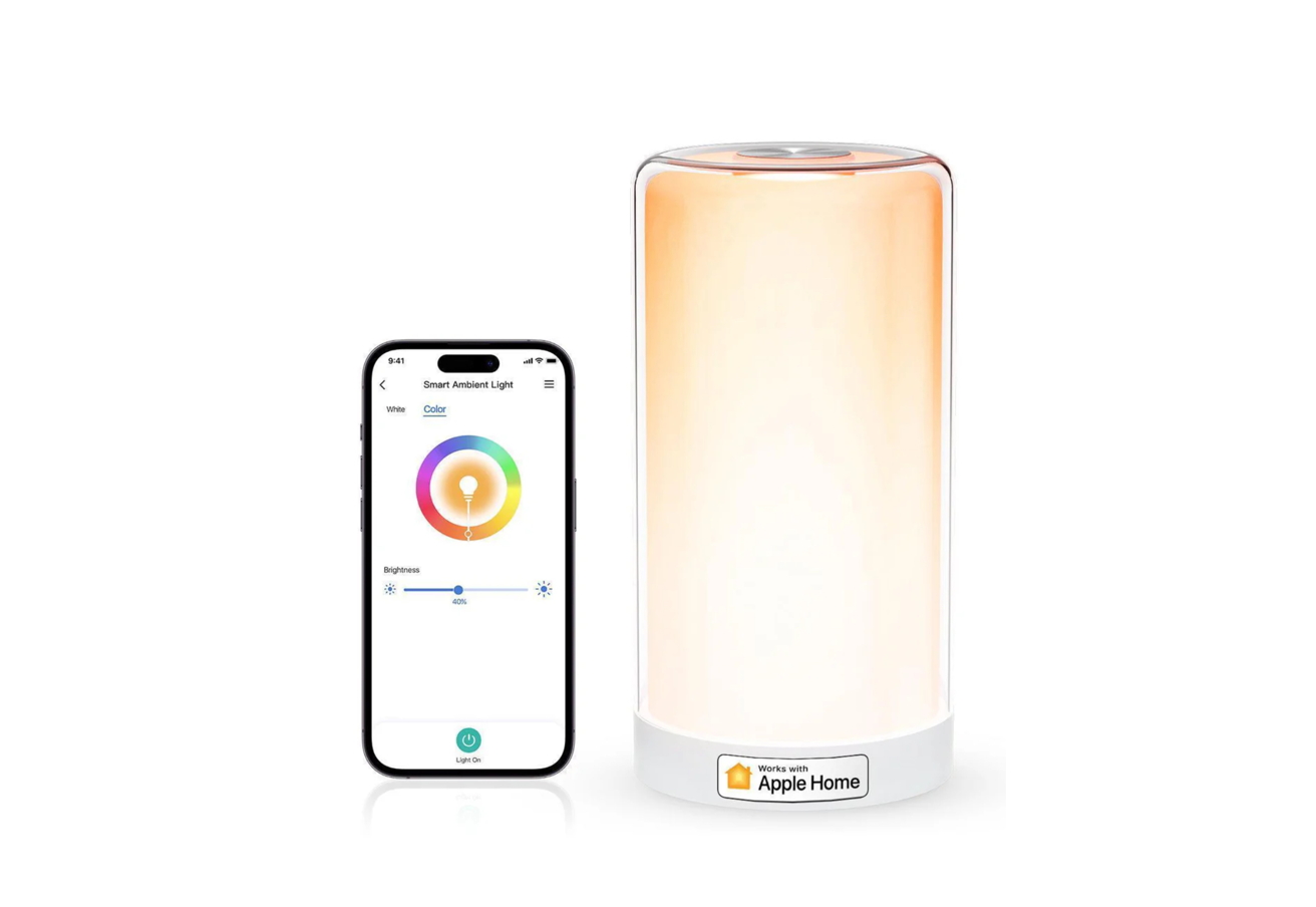 Smartphone displaying ambient light controls next to a cylindrical smart lamp emitting a warm glow, labeled 'Works with Apple Home'.