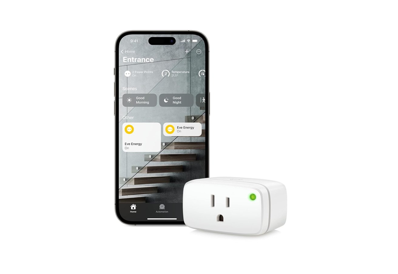 Smartphone displaying home automation app next to a smart plug with a green indicator light.