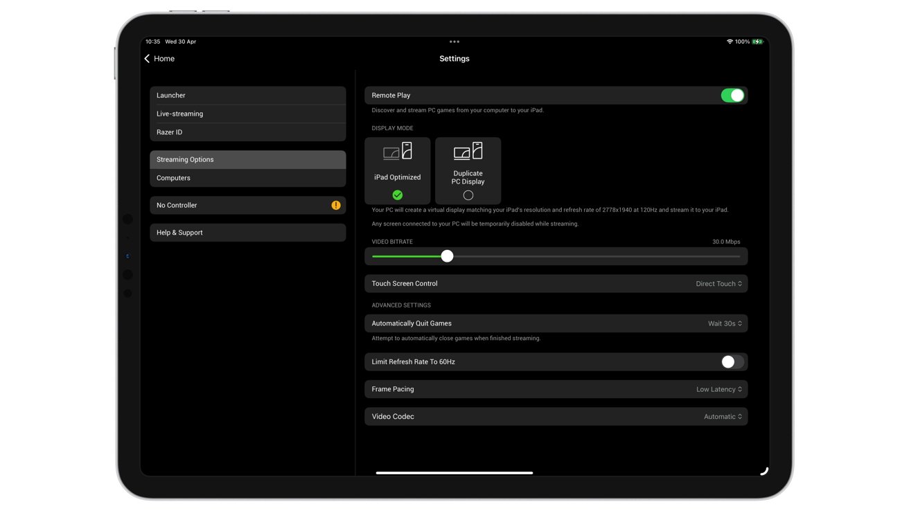 Tablet screen displaying settings menu with options for enabling AirPlay, choosing display mode, and adjusting other device preferences. Dark theme is used.