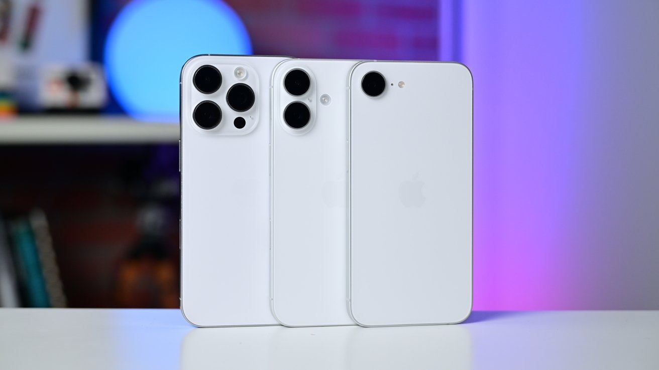 Three white smartphones with different camera layouts displayed on a surface, set against a blurred background with blue and purple lighting.