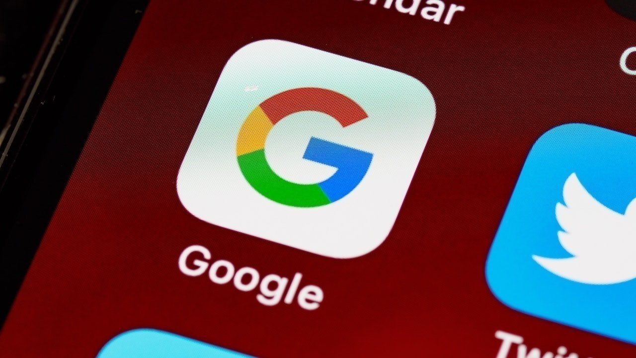 Close-up of a smartphone screen showing the Google app icon, with a colorful G logo on a white square.