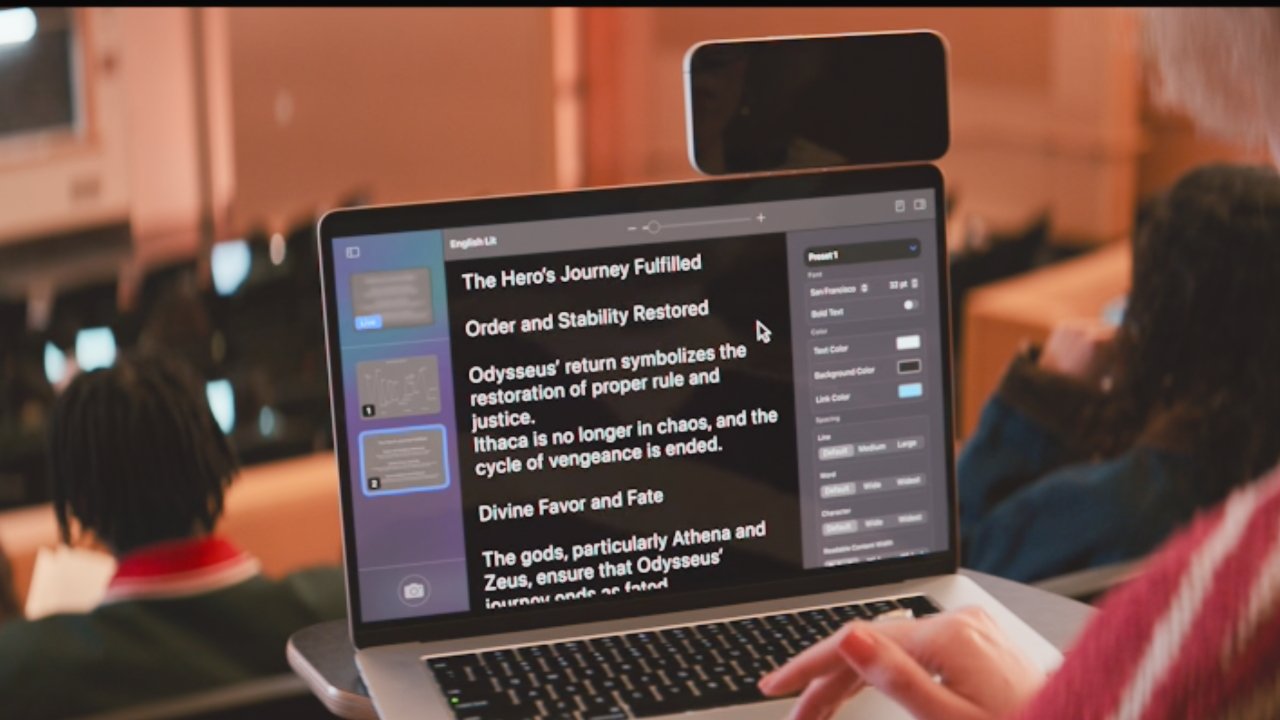 A person takes notes on a laptop in a lecture hall, displaying text about 'The Hero's Journey Fulfilled' and 'Order and Stability Restored.'