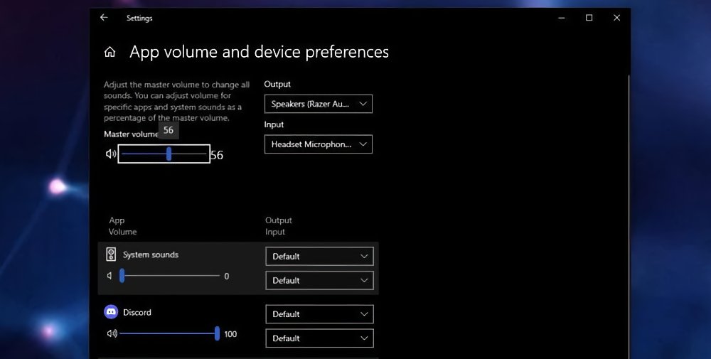 Audio settings screen showing master volume at 56, with options for adjusting app volumes and selecting input and output devices. Discord volume set to 100.