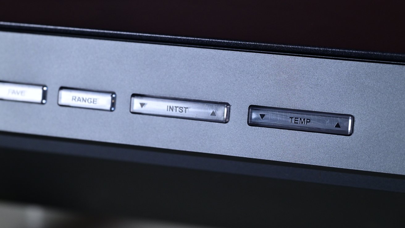 Four metal buttons on a panel labeled SAVE, RANGE, INST, TEMP, each with up and down arrows.