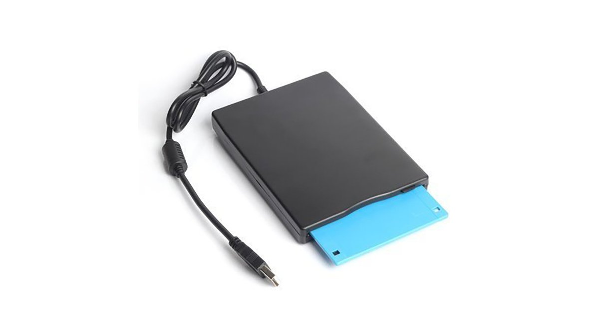 A 3.5-inch USB PC floppy drive for Windows and DOS computers.