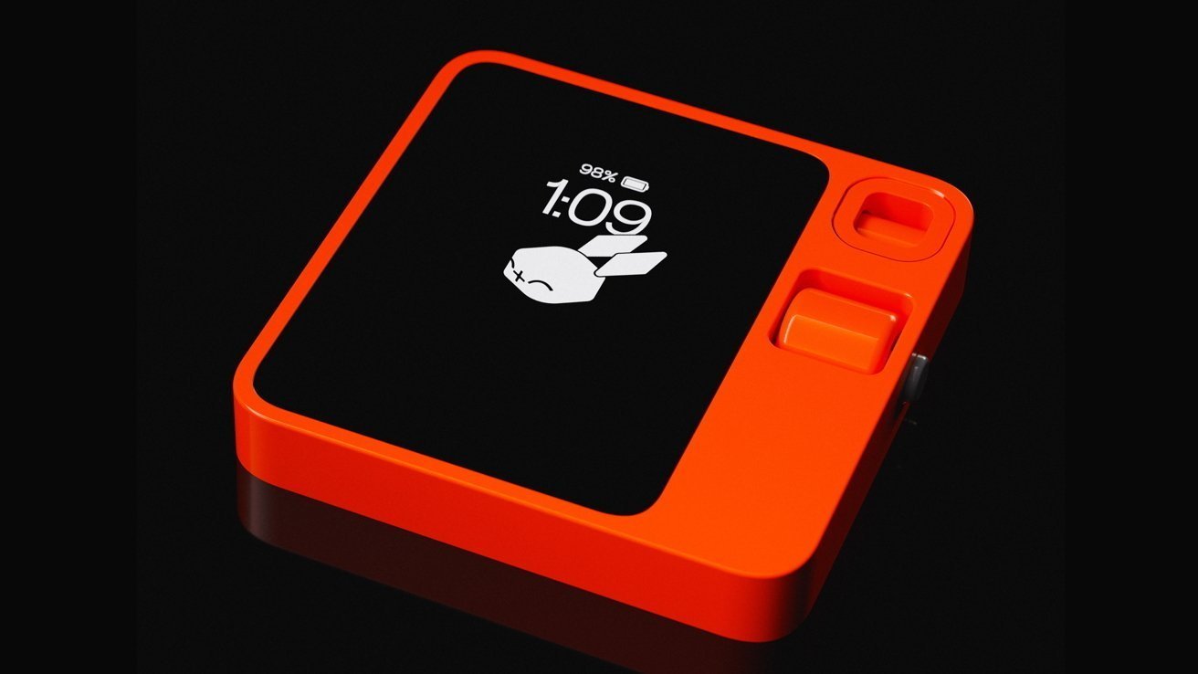 Orange, square digital alarm clock with rounded edges, black screen displaying 1:09, battery icon at 98%, and a cartoonish airplane and sleepy face graphic.