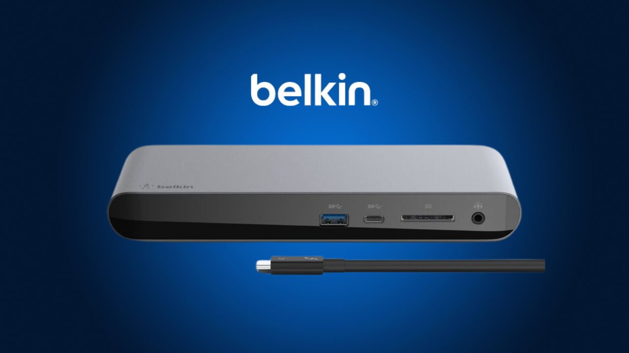 A Belkin Thunderbolt 3 Dock Pro docking station with various ports displayed in front of a blue background, featuring a USB-C connector cable.