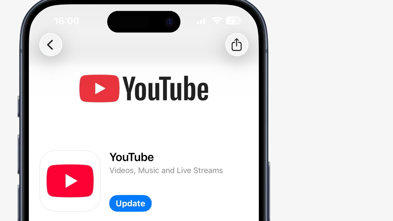 Smartphone screen showing YouTube app with update button, featuring the YouTube logo and description of videos, music, and live streams.