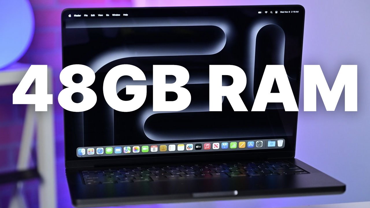 Apple MacBook Pro laptop with a glowing screen displaying a dark abstract design. Large white text reads 48GB RAM. Background features a blurred purple light.