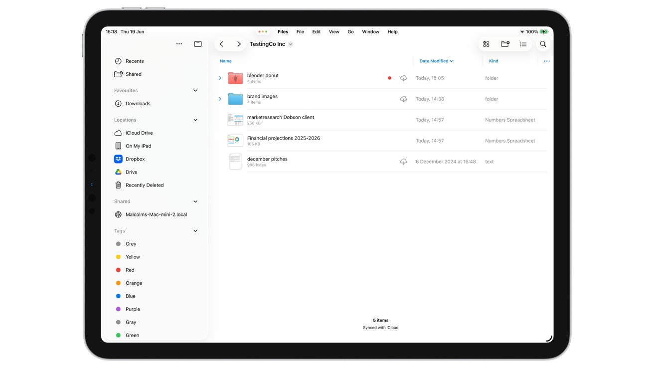 Tablet screen displaying a file manager with a sidebar, folders, and files showing names, sizes, and modification dates.