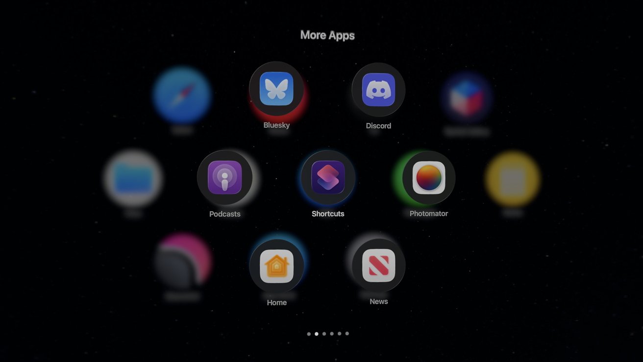Grid of ten app icons including Bluesky, Discord, Podcasts, Shortcuts, and others against a dark background, labeled 'More Apps' at the top.
