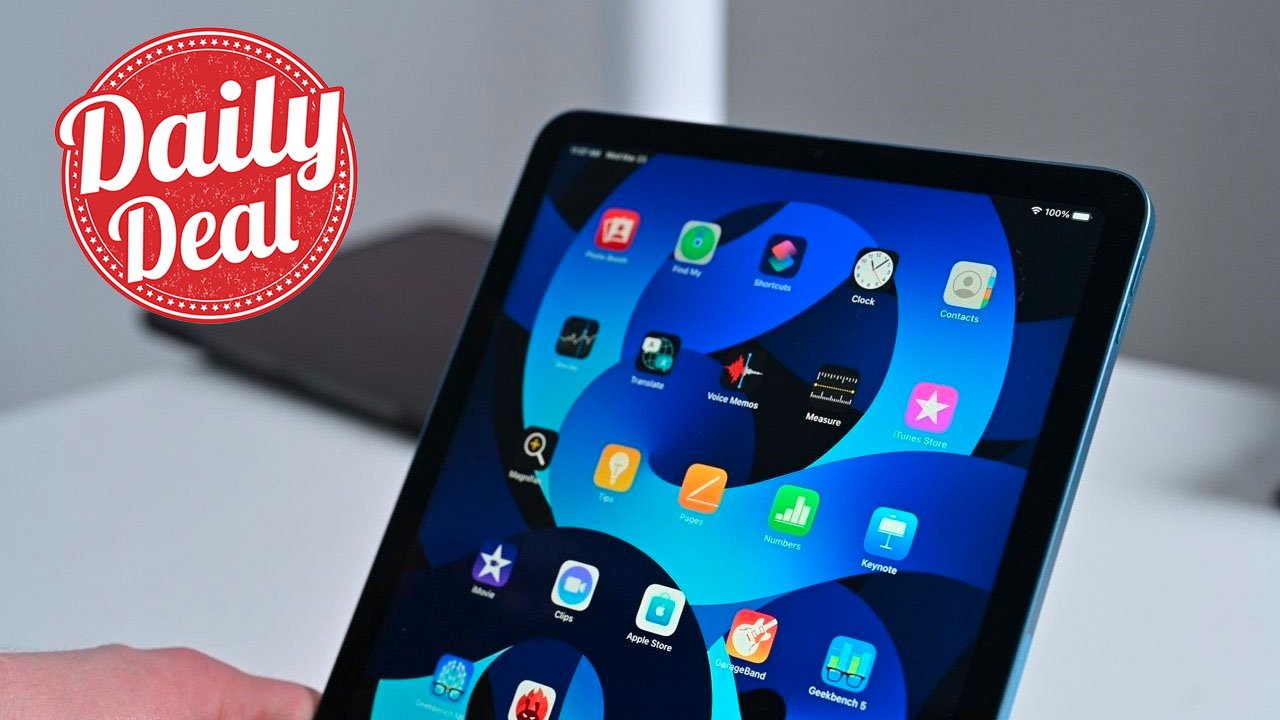 iPad Air displaying colorful app icons on screen, 'Daily Deal' badge on the left, and a soft-focus background.